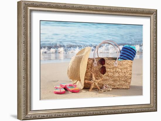 Summer Beach Bag with Straw Hat,Towel,Sunglasses and Flip Flops on Sandy Beach-Liang Zhang-Framed Photographic Print