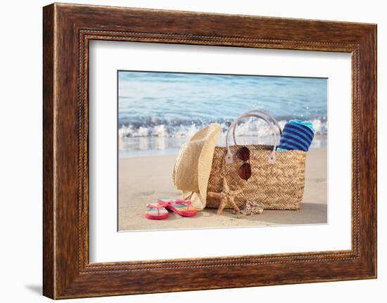 Summer Beach Bag with Straw Hat,Towel,Sunglasses and Flip Flops on Sandy Beach-Liang Zhang-Framed Photographic Print