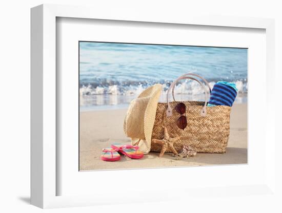 Summer Beach Bag with Straw Hat,Towel,Sunglasses and Flip Flops on Sandy Beach-Liang Zhang-Framed Photographic Print