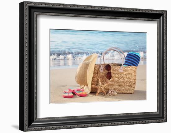 Summer Beach Bag with Straw Hat,Towel,Sunglasses and Flip Flops on Sandy Beach-Liang Zhang-Framed Photographic Print