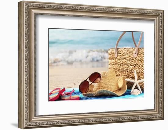 Summer Beach Bag with Straw Hat,Towel,Sunglasses and Flip Flops on Sandy Beach-Sofiaworld-Framed Photographic Print