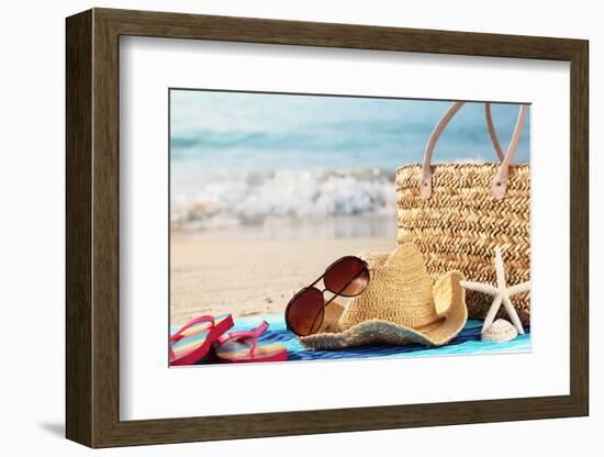 Summer Beach Bag with Straw Hat,Towel,Sunglasses and Flip Flops on Sandy Beach-Sofiaworld-Framed Photographic Print