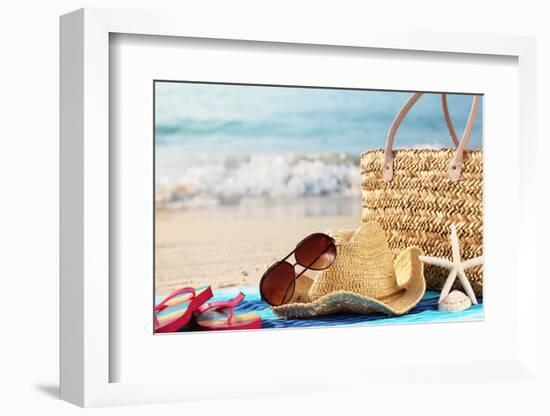 Summer Beach Bag with Straw Hat,Towel,Sunglasses and Flip Flops on Sandy Beach-Sofiaworld-Framed Photographic Print