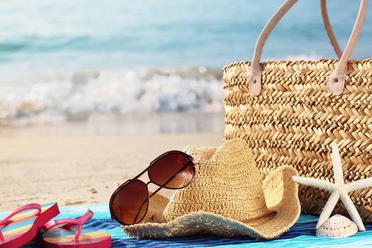 Summer Beach Bag with Straw Hat,Towel,Sunglasses and Flip Flops on Sandy  Beach' Photographic Print - Sofiaworld