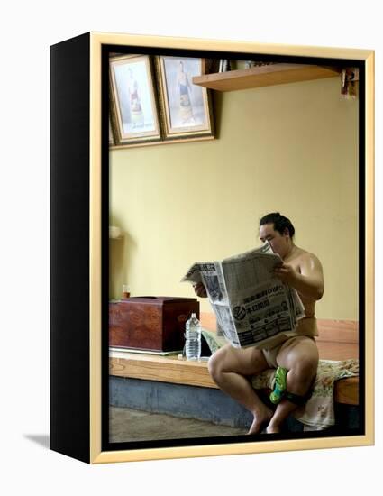 Sumo Wrestler Reading Newspaper, Tokyo City, Honshu Island, Japan-Christian Kober-Framed Premier Image Canvas