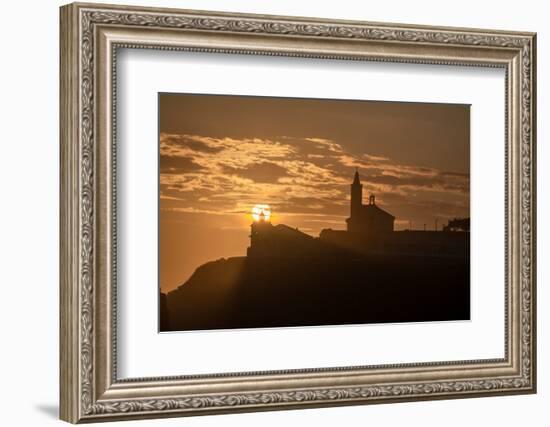 Sun aligned with the silhouette of the lighthouse and church of Luarca, Asturias, Spain, Europe-Francesco Fanti-Framed Photographic Print