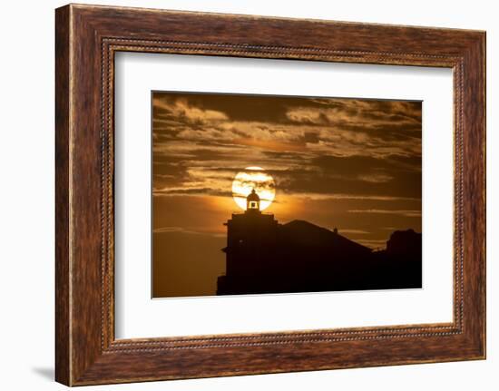 Sun aligned with the silhouette of the lighthouse of Luarca, Asturias, Spain, Europe-Francesco Fanti-Framed Photographic Print