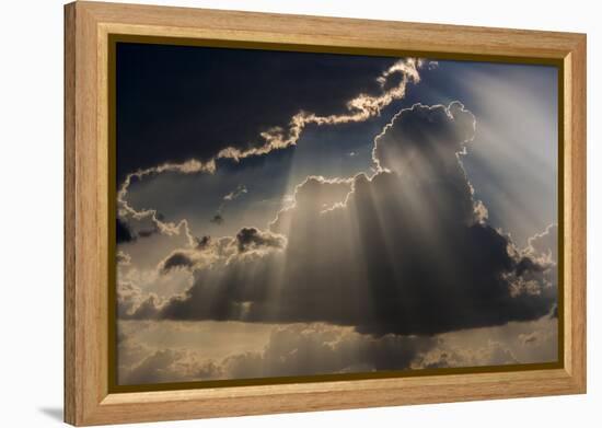 Sun rays and clouds, Togo, Africa-Art Wolfe-Framed Premier Image Canvas