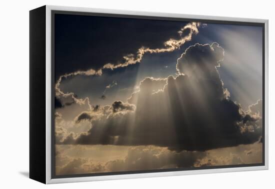 Sun rays and clouds, Togo, Africa-Art Wolfe-Framed Premier Image Canvas