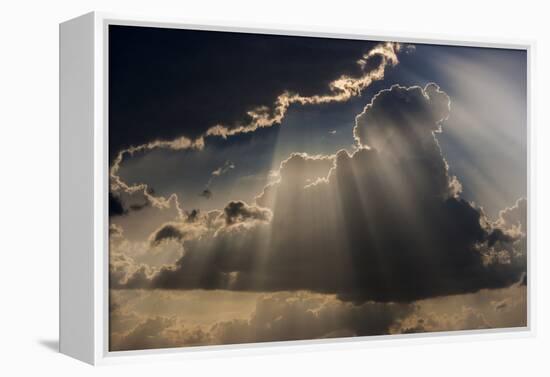 Sun rays and clouds, Togo, Africa-Art Wolfe-Framed Premier Image Canvas