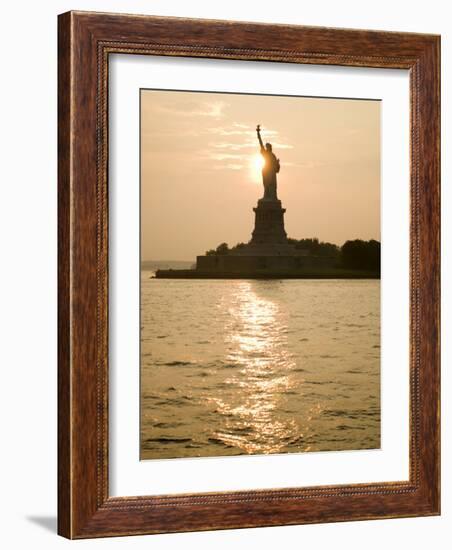 Sun Setting Behind the Statue of Liberty on a Summer Evening-John Nordell-Framed Photographic Print