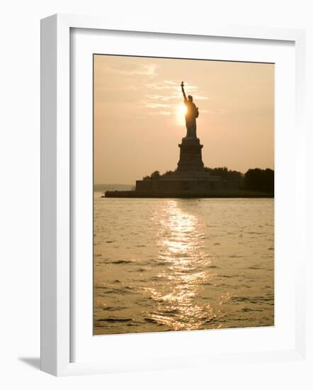 Sun Setting Behind the Statue of Liberty on a Summer Evening-John Nordell-Framed Photographic Print