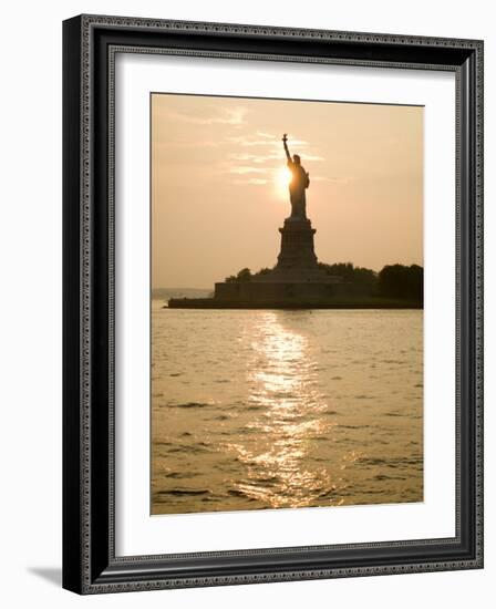 Sun Setting Behind the Statue of Liberty on a Summer Evening-John Nordell-Framed Photographic Print