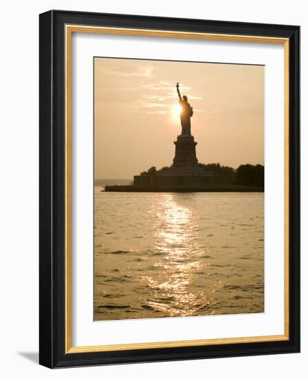 Sun Setting Behind the Statue of Liberty on a Summer Evening-John Nordell-Framed Photographic Print