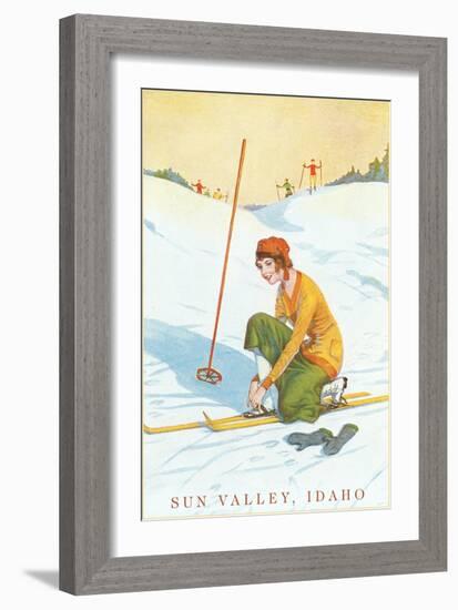 Sun Valley, Idaho, Lady Skier Fixing Bindings-null-Framed Art Print