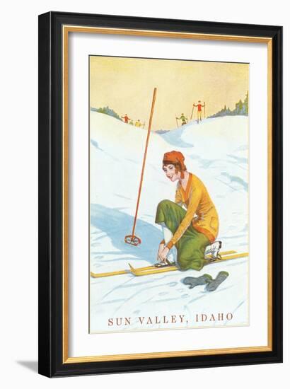 Sun Valley, Idaho, Lady Skier Fixing Bindings-null-Framed Art Print