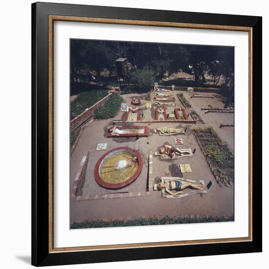 Sunbathers Lay in Sarcophagus Like Crypts with Water, Rancho La Puerta Resort, Tecate, Mexico 1961-Allan Grant-Framed Photographic Print