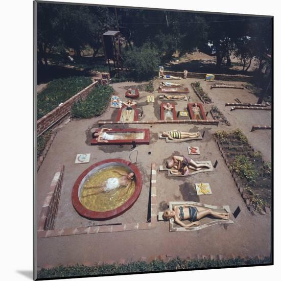 Sunbathers Lay in Sarcophagus Like Crypts with Water, Rancho La Puerta Resort, Tecate, Mexico 1961-Allan Grant-Mounted Photographic Print