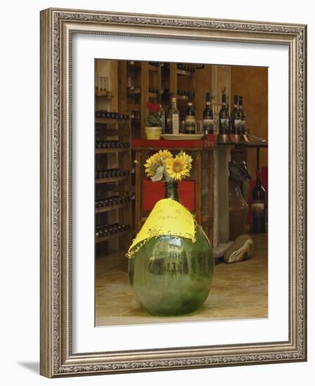 Sunflowers in front of small wine shop, Tuscany, Pienza, Italy-Adam Jones-Framed Photographic Print