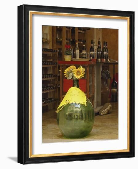 Sunflowers in front of small wine shop, Tuscany, Pienza, Italy-Adam Jones-Framed Photographic Print