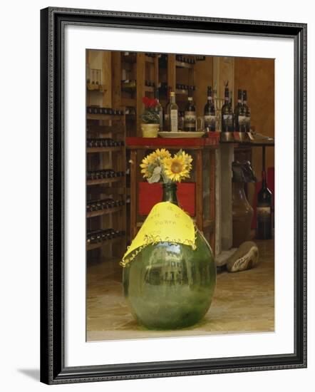 Sunflowers in front of small wine shop, Tuscany, Pienza, Italy-Adam Jones-Framed Photographic Print