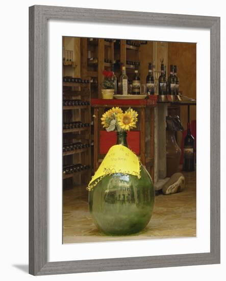 Sunflowers in front of small wine shop, Tuscany, Pienza, Italy-Adam Jones-Framed Photographic Print