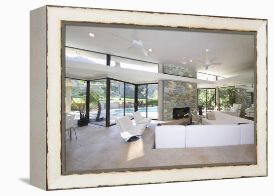 Sunken Seating Area and Exposed Stone Fireplace in Spacious Living Room with View-Nosnibor137-Framed Premier Image Canvas