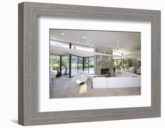 Sunken Seating Area and Exposed Stone Fireplace in Spacious Living Room with View-Nosnibor137-Framed Photographic Print