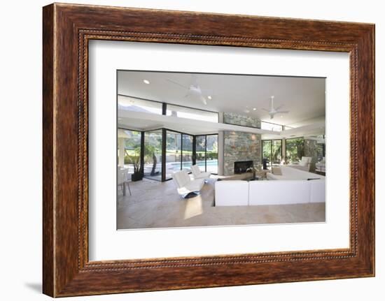 Sunken Seating Area and Exposed Stone Fireplace in Spacious Living Room with View-Nosnibor137-Framed Photographic Print