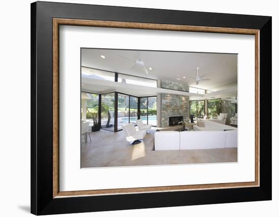 Sunken Seating Area and Exposed Stone Fireplace in Spacious Living Room with View-Nosnibor137-Framed Photographic Print