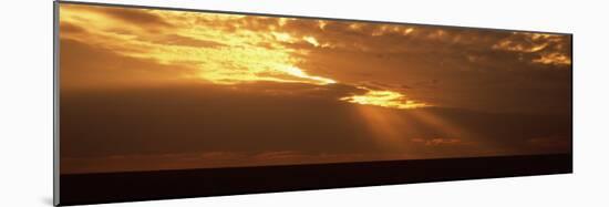 Sunlight Radiating Through Clouds at Sunset, Masai Mara National Reserve, Kenya-null-Mounted Photographic Print