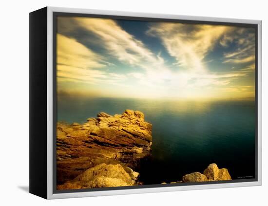 Sunlight Reflecting off Blue Waters off Cliffside-Jan Lakey-Framed Premier Image Canvas