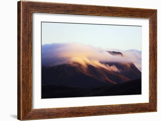 Sunrise on a cloud topped mountain, Andringitra National Park, Ambalavao, central area, Madagascar,-Christian Kober-Framed Photographic Print