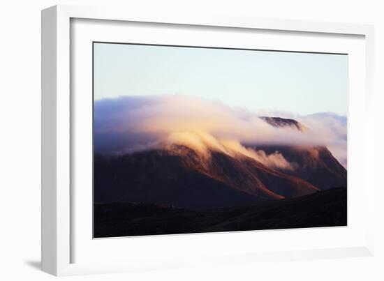 Sunrise on a cloud topped mountain, Andringitra National Park, Ambalavao, central area, Madagascar,-Christian Kober-Framed Photographic Print