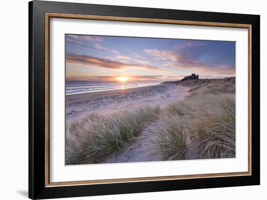 Sunrise over Bamburgh Beach and Castle from the Sand Dunes, Northumberland, England. Spring (March)-Adam Burton-Framed Photographic Print