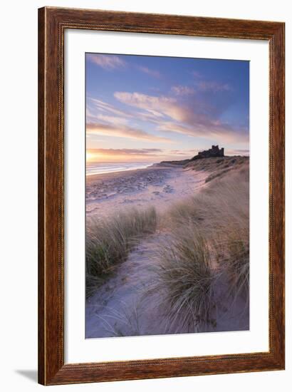 Sunrise over Bamburgh Beach and Castle from the Sand Dunes, Northumberland, England. Spring (March)-Adam Burton-Framed Photographic Print