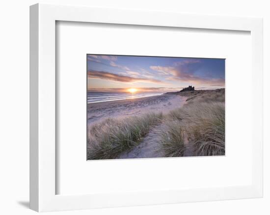 Sunrise over Bamburgh Beach and Castle from the Sand Dunes, Northumberland, England. Spring (March)-Adam Burton-Framed Photographic Print