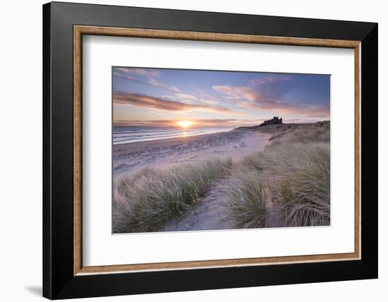 Sunrise over Bamburgh Beach and Castle from the Sand Dunes, Northumberland, England. Spring (March)-Adam Burton-Framed Photographic Print