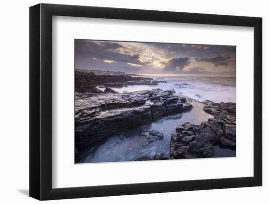 Sunrise over the dramatic rocky coastline of Porthcawl in winter, South Wales-Adam Burton-Framed Photographic Print