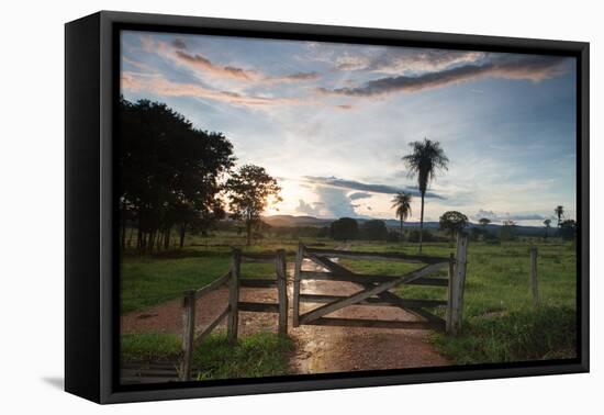 Sunset at the Gate of a Bonito Farm, with Rolling Hills in the Background-Alex Saberi-Framed Premier Image Canvas