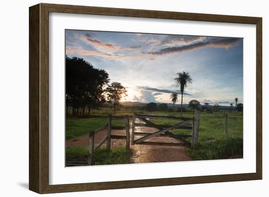 Sunset at the Gate of a Bonito Farm, with Rolling Hills in the Background-Alex Saberi-Framed Photographic Print