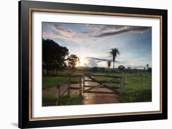 Sunset at the Gate of a Bonito Farm, with Rolling Hills in the Background-Alex Saberi-Framed Photographic Print