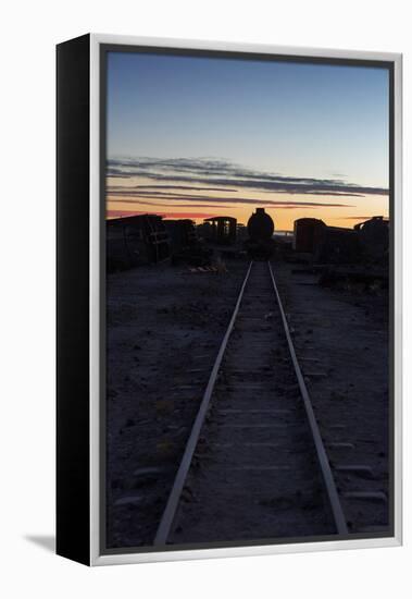 Sunset at the Train Graveyard in Uyuni, Bolivia-Alex Saberi-Framed Premier Image Canvas