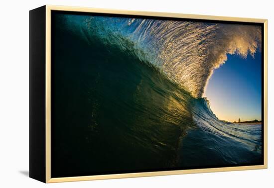 Sunset back lights a tubing wave-Mark A Johnson-Framed Premier Image Canvas