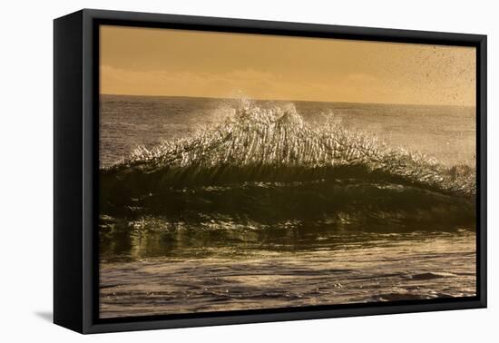 Sunset back lights a tubing wave-Mark A Johnson-Framed Premier Image Canvas