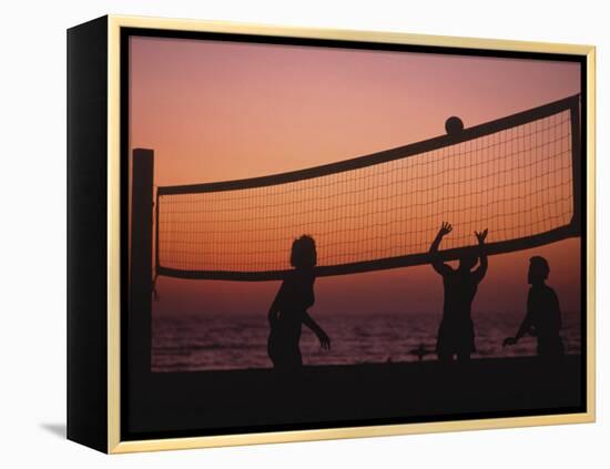 Sunset Beach Volleyball-Mitch Diamond-Framed Premier Image Canvas