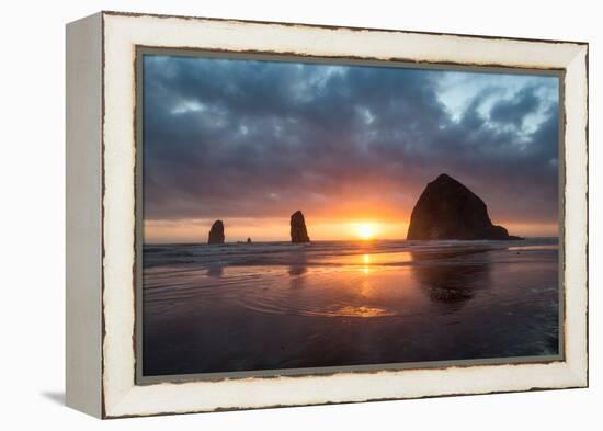 Sunset behind Haystack Rock at Cannon Beach on the Pacific Northwest coast, Oregon, United States o-Martin Child-Framed Premier Image Canvas