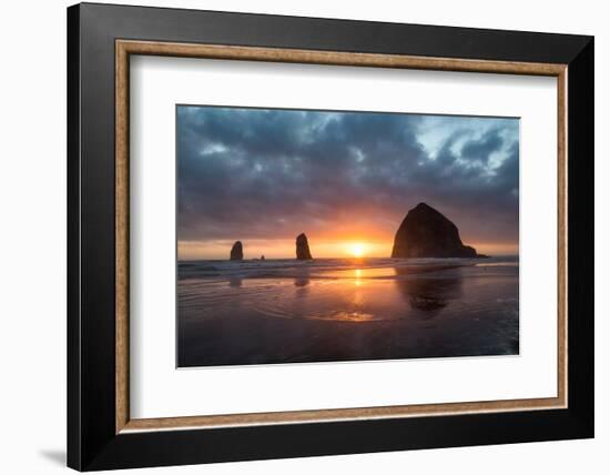 Sunset behind Haystack Rock at Cannon Beach on the Pacific Northwest coast, Oregon, United States o-Martin Child-Framed Photographic Print