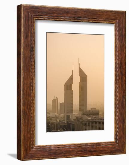 Sunset Engulfs the Jumeirah Emirates Towers Hotel Dubai, Uae-Michael DeFreitas-Framed Photographic Print