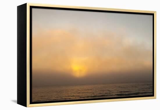 Sunset Light Shining Through Fog Bank of the Florida Coast-James White-Framed Premier Image Canvas